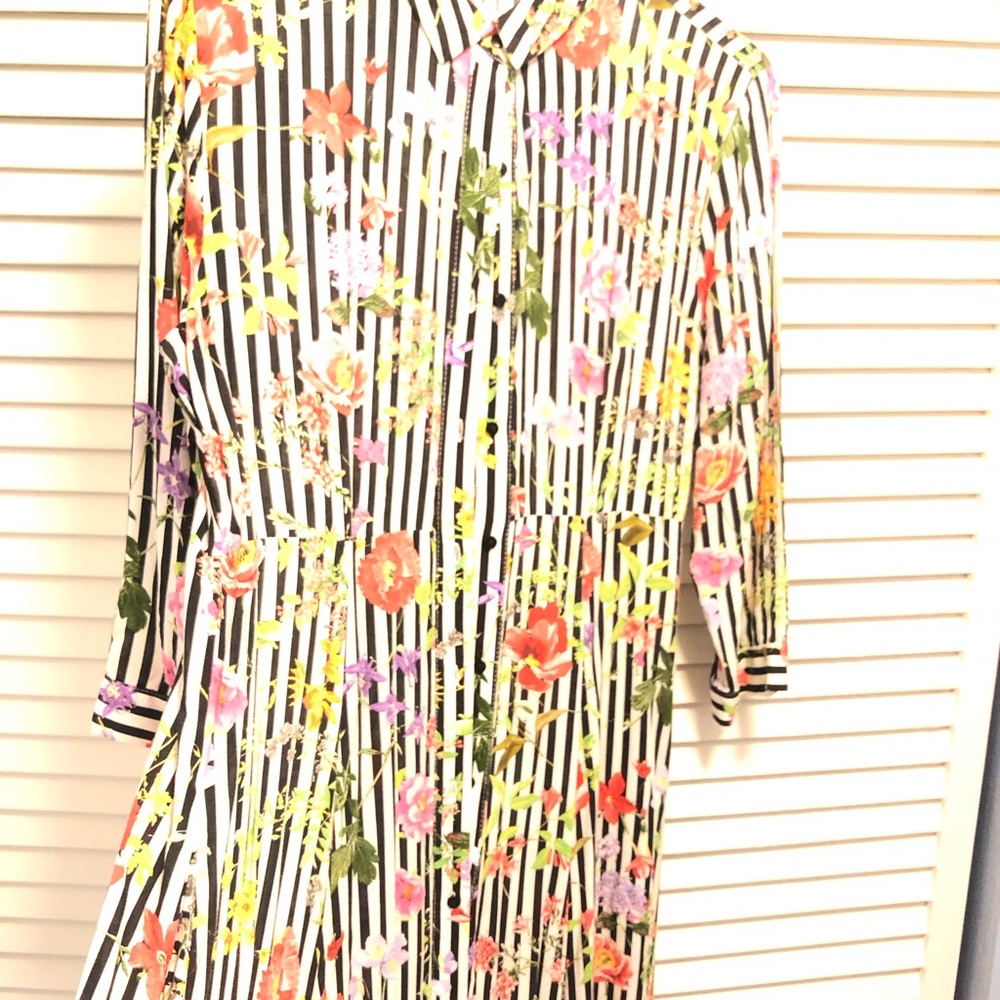 Cute Zara print maxi. Easy wash and wear. Always gets compliments!